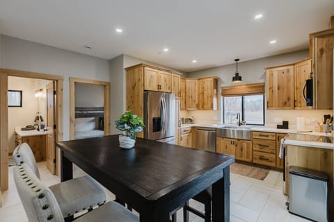 Enjoy your creations at the dining table with seating for four.