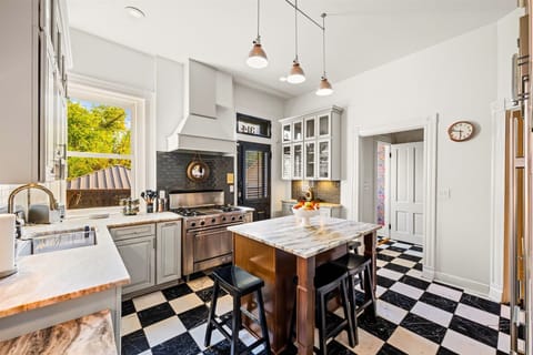 A well-stocked, elegant kitchen featuring high-end appliances — perfect for creating memorable meals with family and friends.