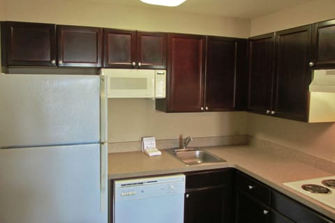 Suite, 1 King Bed, Non Smoking | Private kitchen | Fridge, microwave, stovetop, coffee/tea maker