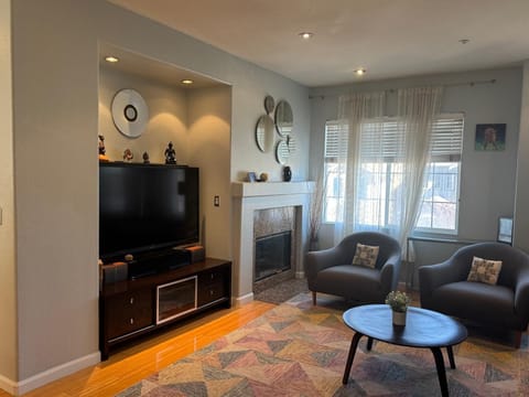 Apartment, 2 Bedrooms | Living area | 55-inch LED TV with digital channels