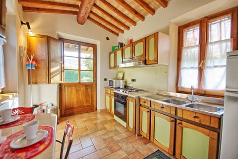 Apartment, 1 Bedroom (Il Cottage) | Private kitchen | Fridge, stovetop