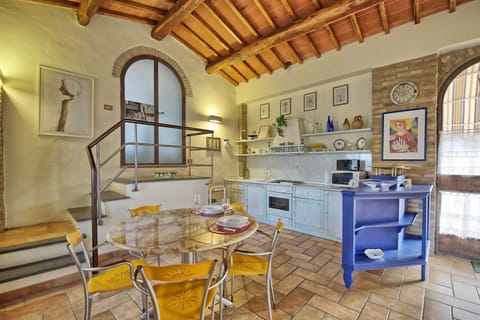 Apartment, 1 Bedroom (La Capanna) | Private kitchen | Fridge, stovetop