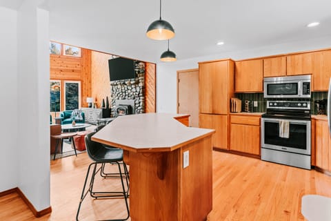 An open kitchen that flows right into the living room — perfect for cooking, gathering, and staying connected.