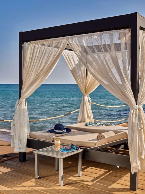 Private beach, beach cabanas, sun loungers, beach umbrellas