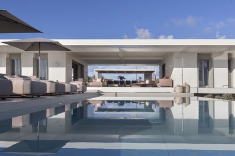 The two wings and central, communal terrace of Amira seen from the splendid pool.