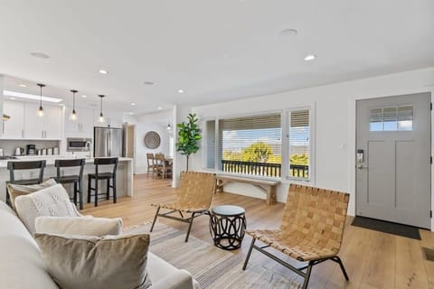 House | Living room | 80-inch Smart TV with cable channels