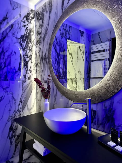 Junior Suite, 1 King Bed with Sofa bed | Bathroom | Hair dryer, slippers, bidet, towels