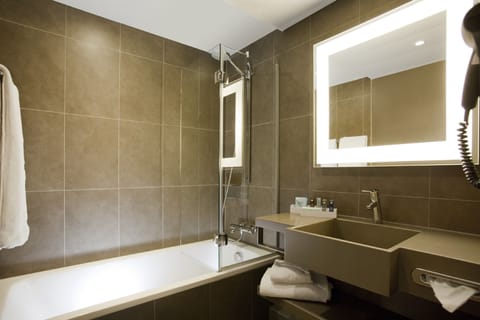 Eco-friendly toiletries, hair dryer, towels