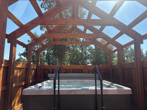Enjoy ultimate stargazing in our new private hot tub and gazebo with clear roof.