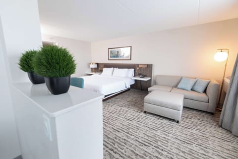 Suite, 1 King Bed (Wet Bar) | Living area | 37-inch flat-screen TV with cable channels, TV, pay movies