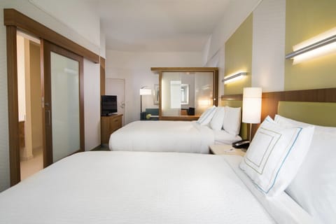 Suite, Multiple Beds | Premium bedding, desk, blackout drapes, iron/ironing board