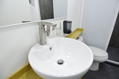 Basic Single Room | Bathroom | Shower, towels, soap, shampoo