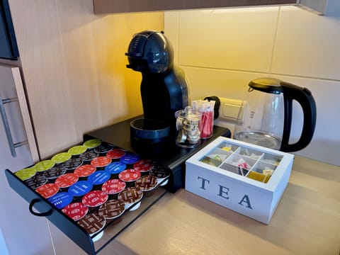 Coffee & tea corner with wide selection of pods, hot chocolate, and teas