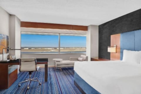 Room, 1 King Bed, View (Runway View) | Premium bedding, down comforters, pillowtop beds, minibar