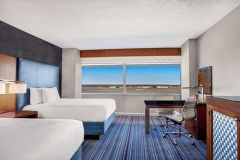 Room, 2 Queen Beds, View (Runway View) | Premium bedding, down comforters, pillowtop beds, minibar