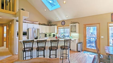 Four more can sit at the Island