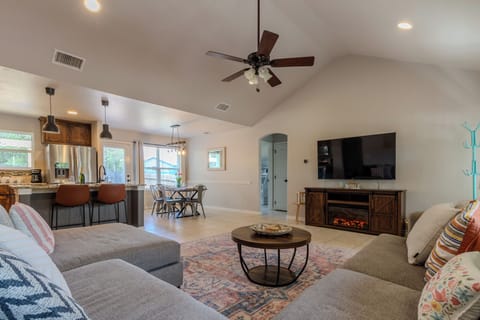 Your home away from home. A light-filled living room with a cozy, welcoming vibe