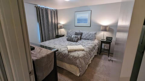 Walking in, straight ahead is the Primary Bedroom with attached Bathroom