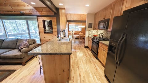 Galley Kitchen with gas range and oven