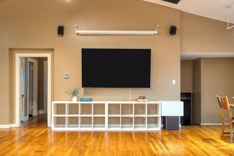 Large flat-screen TV for movie nights.