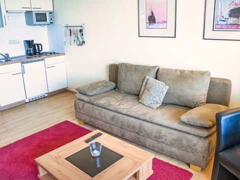 Furniture, Interior Design, Flooring, Floor, Room, Couch, Wood, Living Room, Wood Flooring