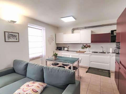 Furniture, Kitchen, Interior Design, Flooring, Countertop, Kitchen Appliance, Major Appliance, Floor, Room, Table