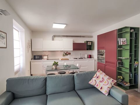 Furniture, Interior Design, Wall, Flooring, Kitchen, Room, Floor, Couch, Ceiling, Apartment