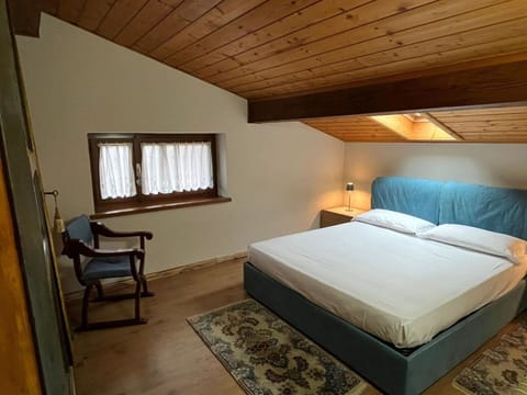 Bed, Interior Design, Bedroom, Furniture, Wood, Floor, Flooring, Bed Sheet, Ceiling, Room