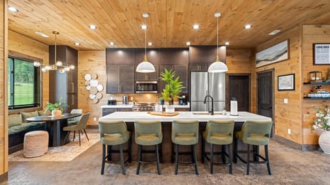 Gorgeous kitchen with ample counter seating and breakfast nook