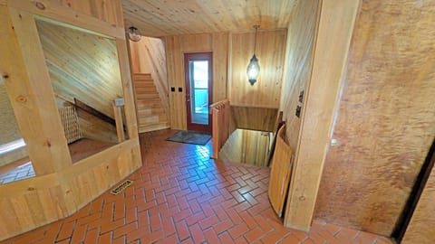 The garage enters to this Foyer