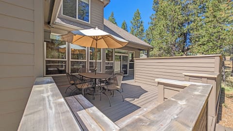 Doors lead out to the deck with Hot Tub, Grill and Dining