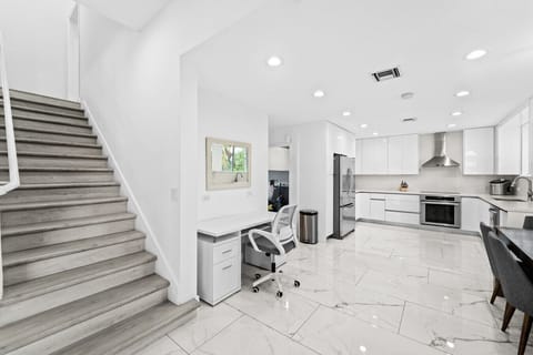 Multi Level Home with Seamless Flow Between Kitchen and Living Spaces