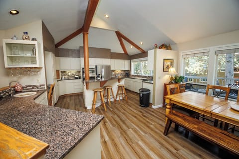 The kitchen is nicely open with island seating and Stainless Steel Appliances