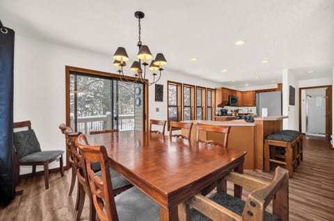 The dining area with extra seats. A card table is available for extra seating.