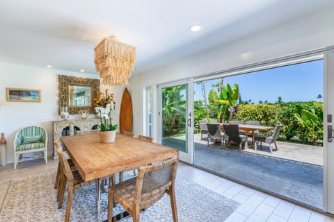 Room for everyone to spread out and relax—this bright, open space connects effortlessly to the lanai for true island-style indoor-outdoor living