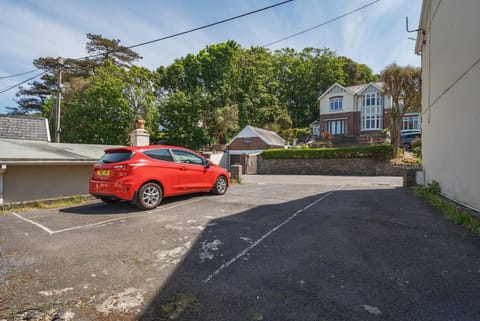 There's dedicated parking for 2 cars at the back of the house.