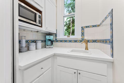 Coffee nook featuring 2 coffee makers and a french press