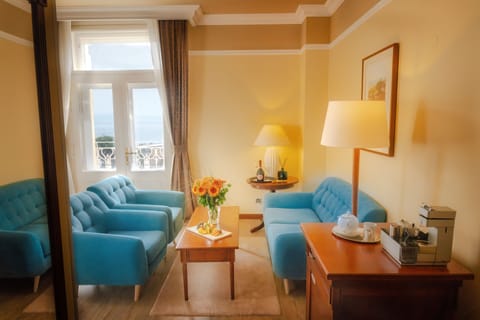 Suite, Balcony, Sea View | Living area | 55-inch LCD TV with satellite channels, TV