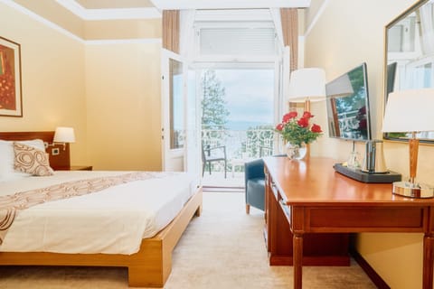 Deluxe Double or Twin Room, Balcony, Sea View | Down comforters, minibar, in-room safe, desk