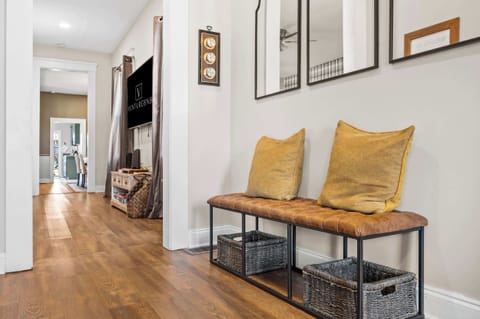 Living Room: Every detail thoughtfully chosen for your comfort. From the plush leather seating to the charming decor, our living room is a sanctuary waiting for you to make memories. 