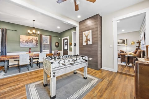 Dining Area: Dinner and a game, anyone? Our versatile dining area not only hosts memorable meals but also features a foosball table and dart board for some friendly competition and endless fun! Get ready for good food and great times.