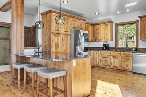 Kitchen: Drip coffee maker, Keurig, Crockpot, toaster oven, blender, cooking utensils, tableware