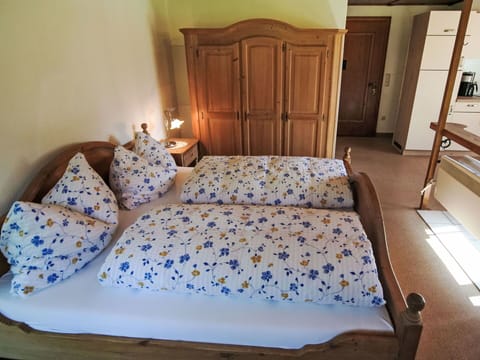 Furniture, Bedroom, Wood, Interior Design, Bed, Bed Sheet, Bedding, Flooring, Lighting, Linens