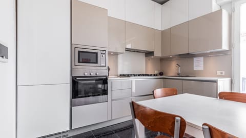 living and fully equipped kitchen