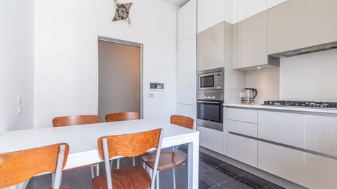 living and fully equipped kitchen