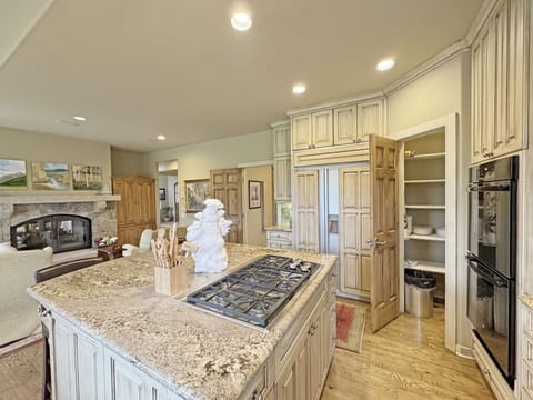 This kitchen is loaded up with everything you need to cook and eat in as you would at home