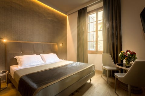 Deluxe Double Room, Garden View | In-room safe, desk, free WiFi, bed sheets