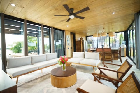 Experience seamless indoor-outdoor living in this open-concept space, where modern design meets natural elegance.
