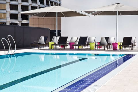 Outdoor pool, pool umbrellas, sun loungers