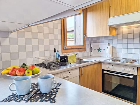 Kitchen, Kitchen Appliance, Interior Design, Major Appliance, Countertop, Flooring, Wood, Furniture, Ceiling, Floor